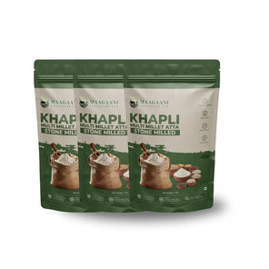 Three packages of Maagaani Khapli Multi Millet Atta on a white background