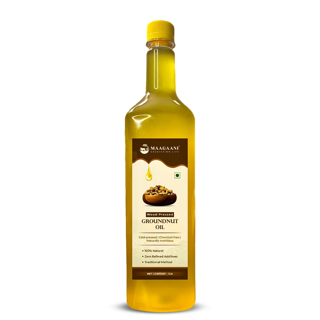 Bottle of Maaganti Groundnut Oil on a white background