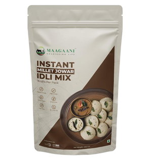 Packaging of Maagaani Instant Jowar Idli Mix featuring the product name, an image of idlis, and the claim of making 16 idlis per pack.