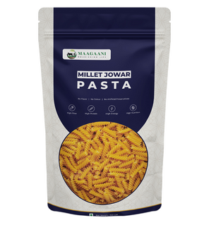 Packaging of Maagaani Low GI Jowar Millet Pasta showing the pasta inside a transparent window, with the brand logo and product information.