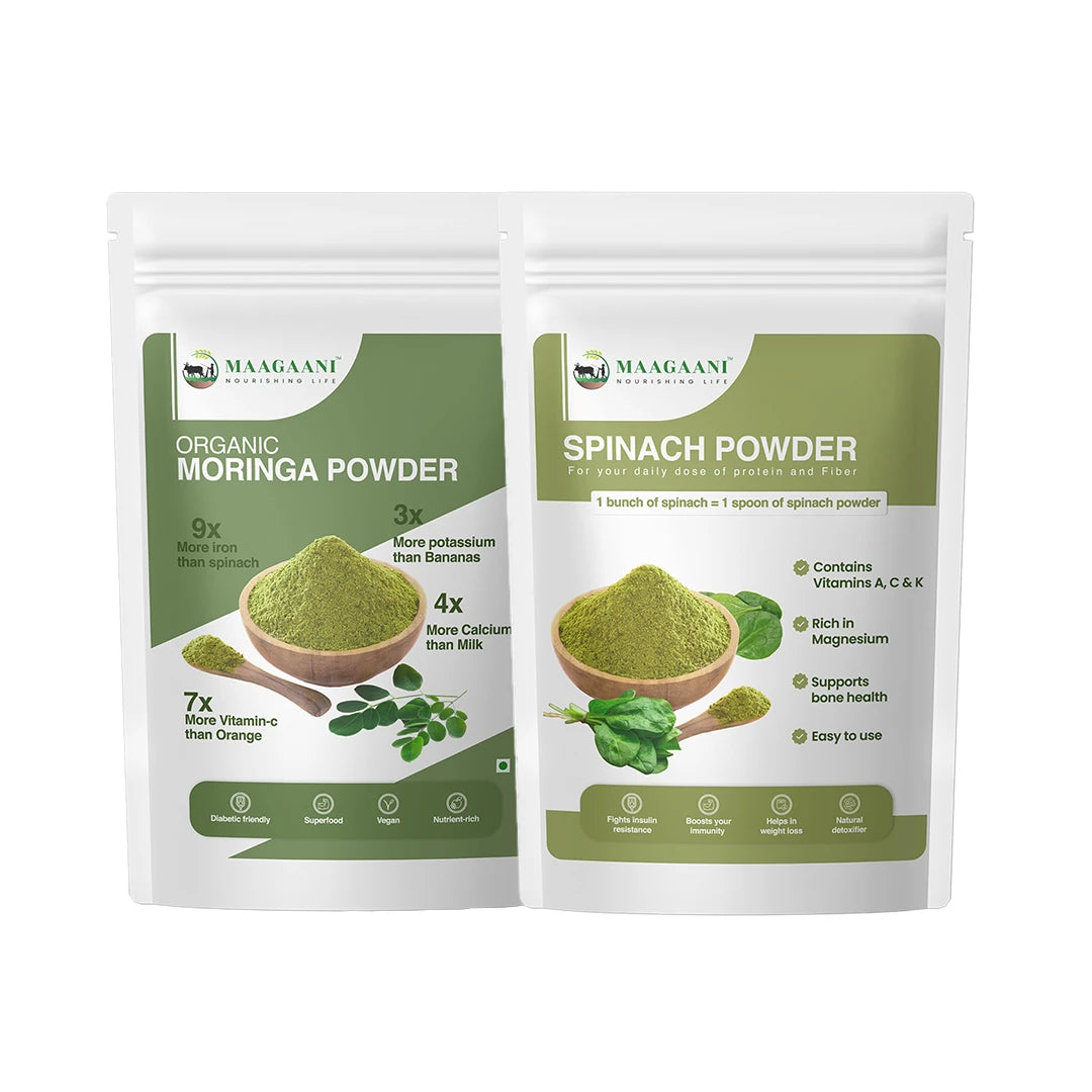 Two packages of Maaganti Organic Moringa Powder and Spinach Powder on a white background